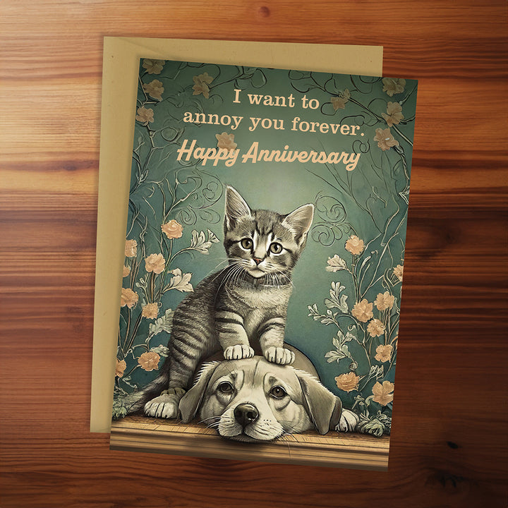 Greeting card with a cat and dog illustration and text on a wooden surface