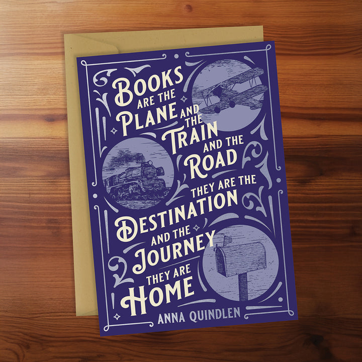 Card with motivational quote about books on a wooden surface