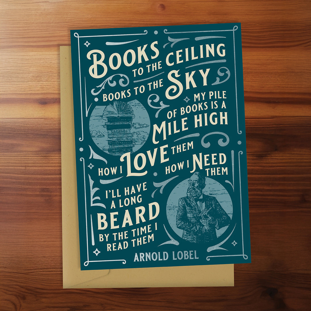 Book with a quote by Arnold Lobel on a wooden surface