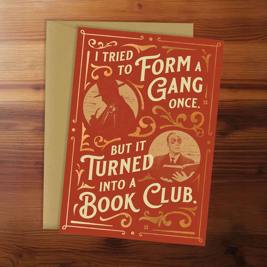 Card with text and illustrations on a wooden surface