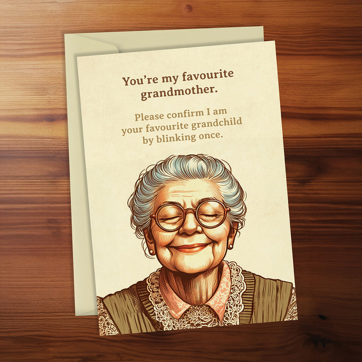 Greeting card with illustration of an elderly woman and humorous text on a wooden surface