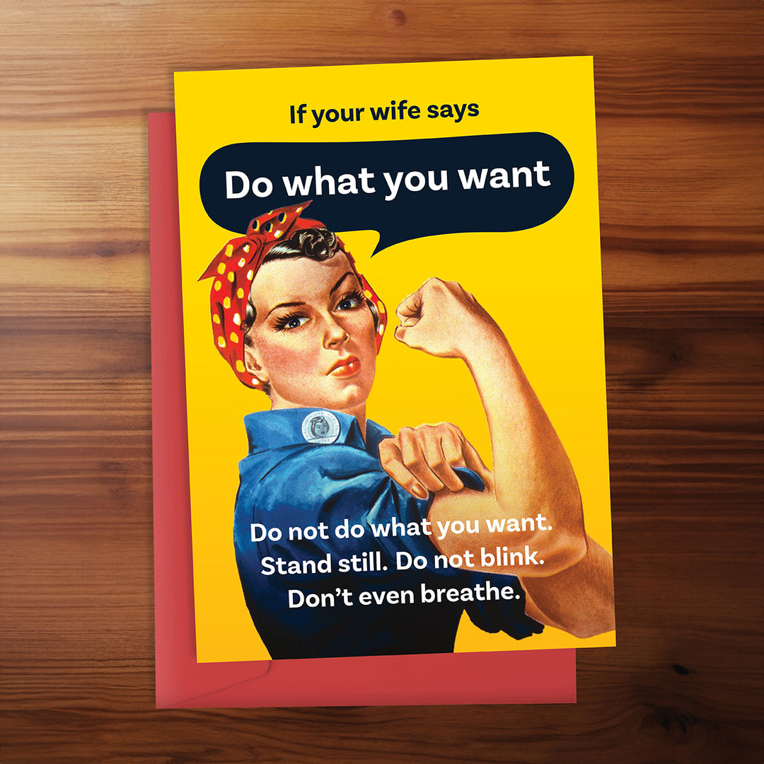Card with vintage-style illustration of a woman in a blue dress and red headscarf, with text on a wooden surface.