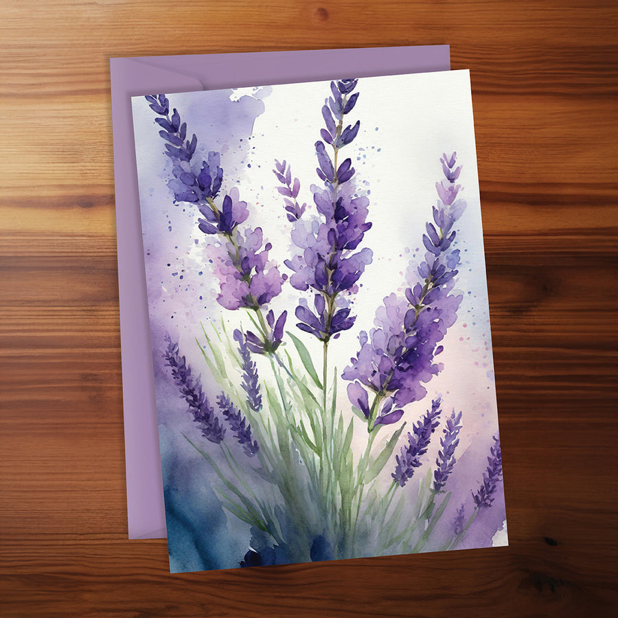 Greeting card with lavender design on a wooden surface