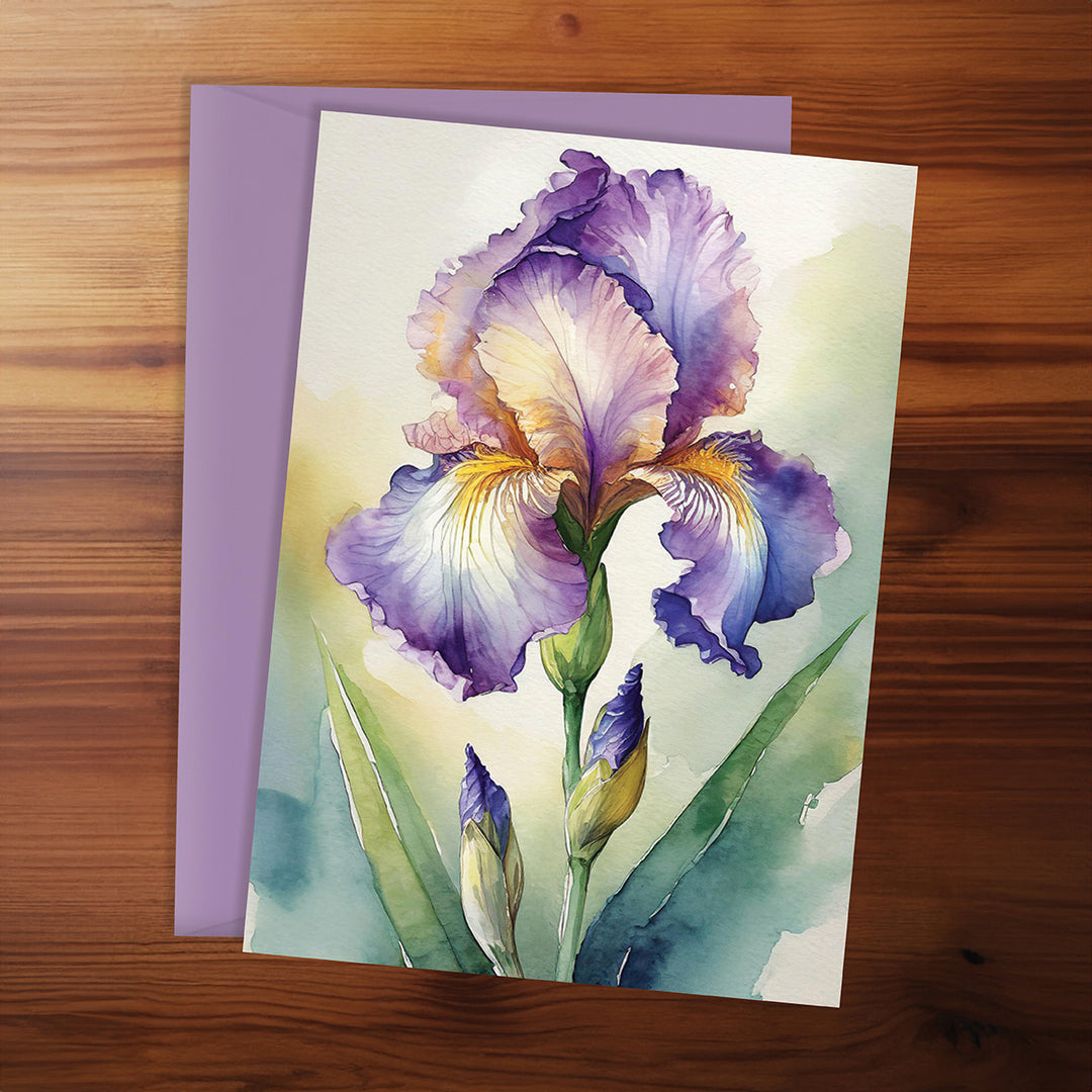 Greeting card with a purple iris flower on a wooden surface