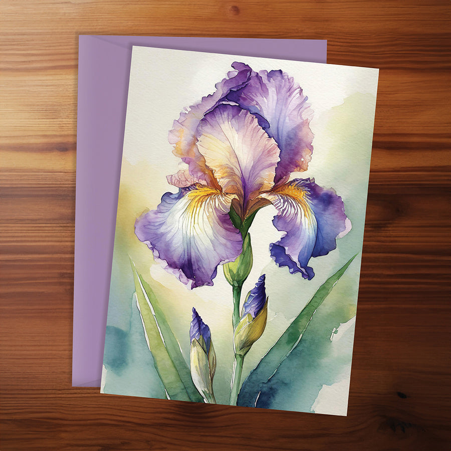 Greeting card with a purple iris flower on a wooden surface