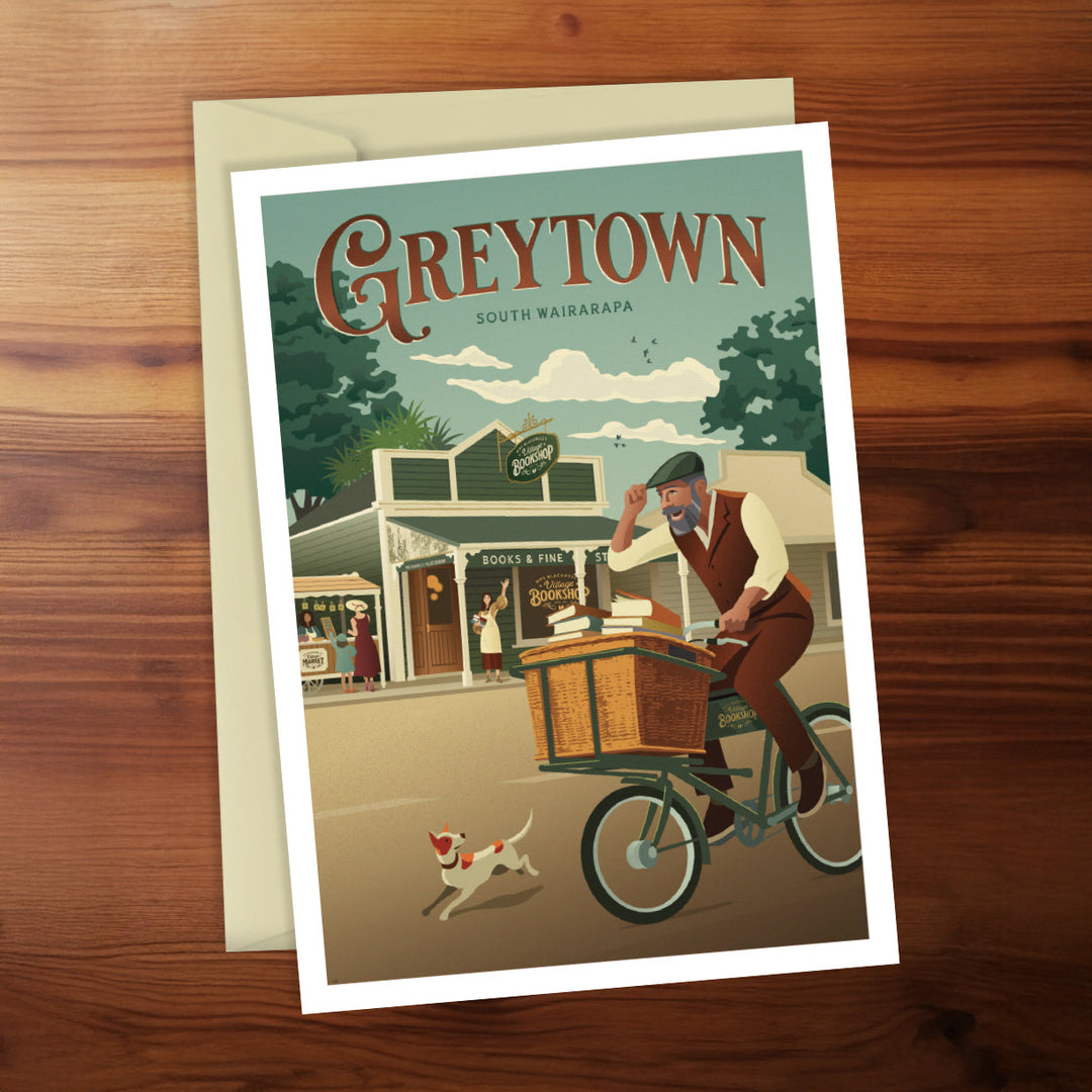 Illustrated poster of a man on a bike with a dog, set against a town scene, on a wooden surface.